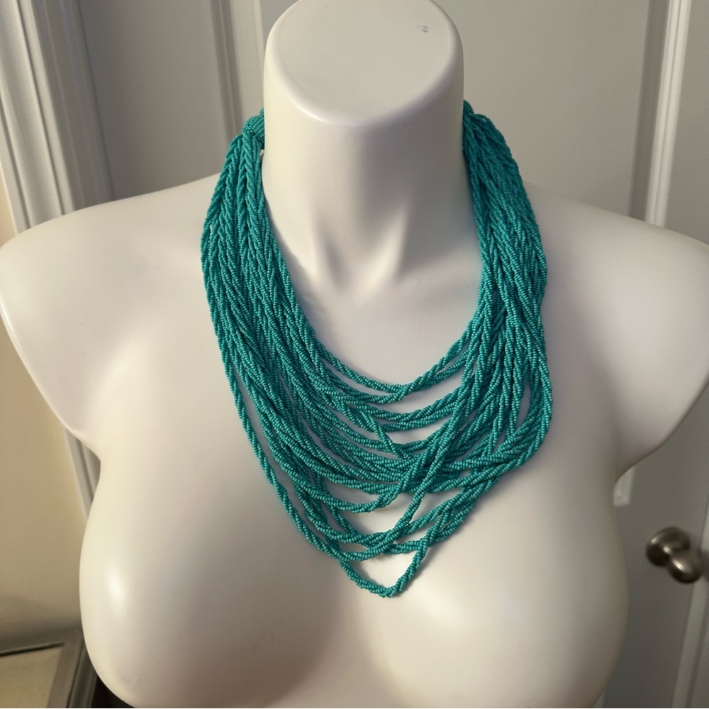 Faux turquoise multi strand beaded adjustable necklace
